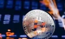 比特币日内涨超5% 现报21615美元/枚