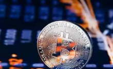 区块链概念股盘前走弱 比特币再度跌破2万美元关口